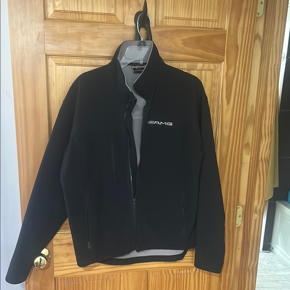 Black Performance Jacket with Stand-Up Collar and Zip-Up Style
